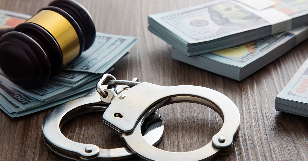 Concept for corruption, fraud and money laundry. Handcuff