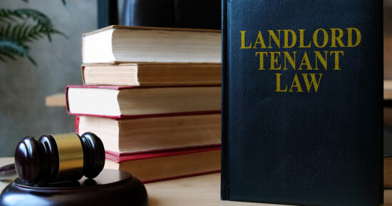 Landlord tenant law book on the lawyer desk.