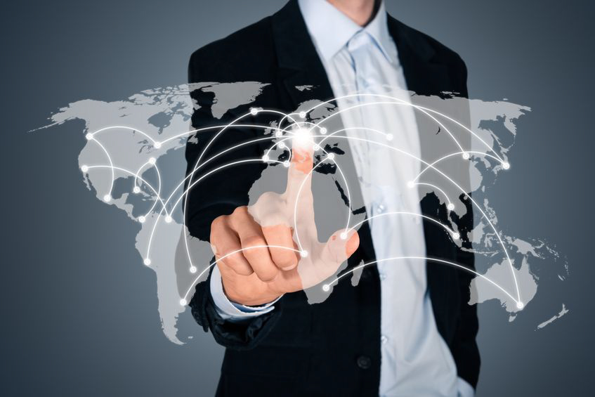 Finger on a map of the world