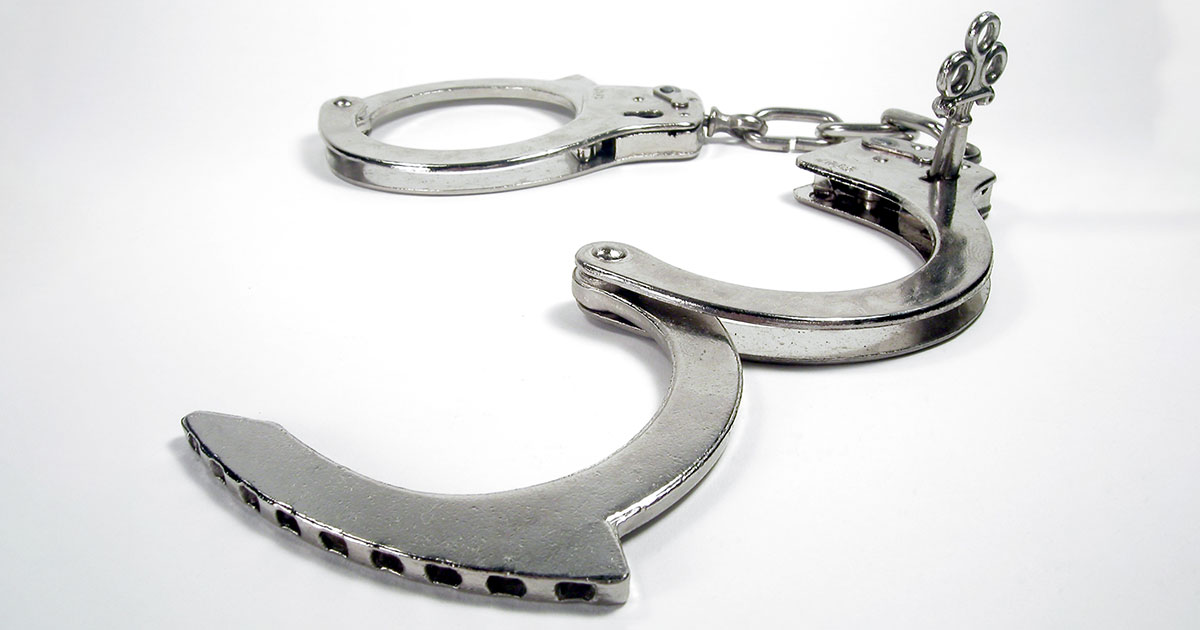 Stock Photo of Unlocked Handcuffs