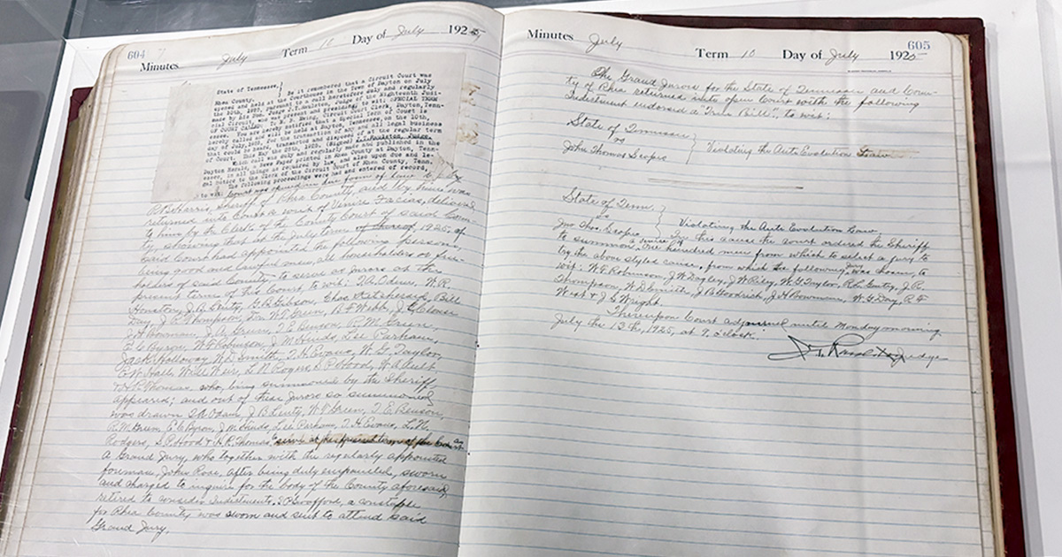 an old book with writing in pencil