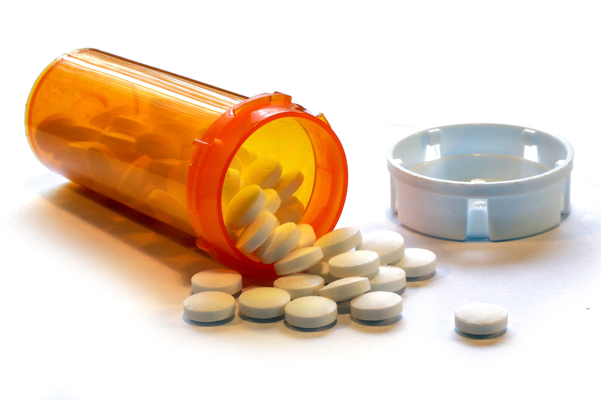 Open bottle of prescription pills