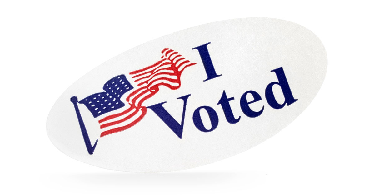 A close-up of an election sticker